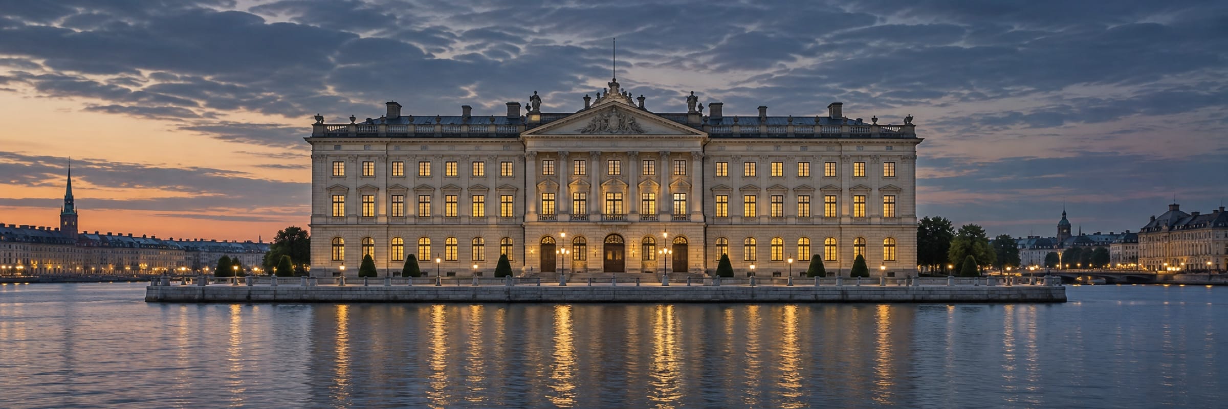Klassisk stenbyggnad vid vattnet i Stockholm i skymningen